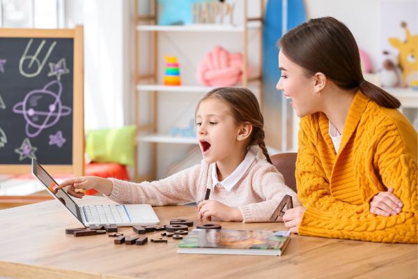 Child receiving support from a child therapist