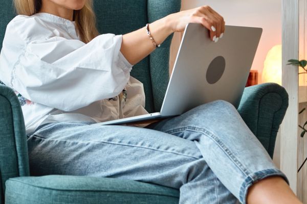 Woman using a laptop for virtual counseling